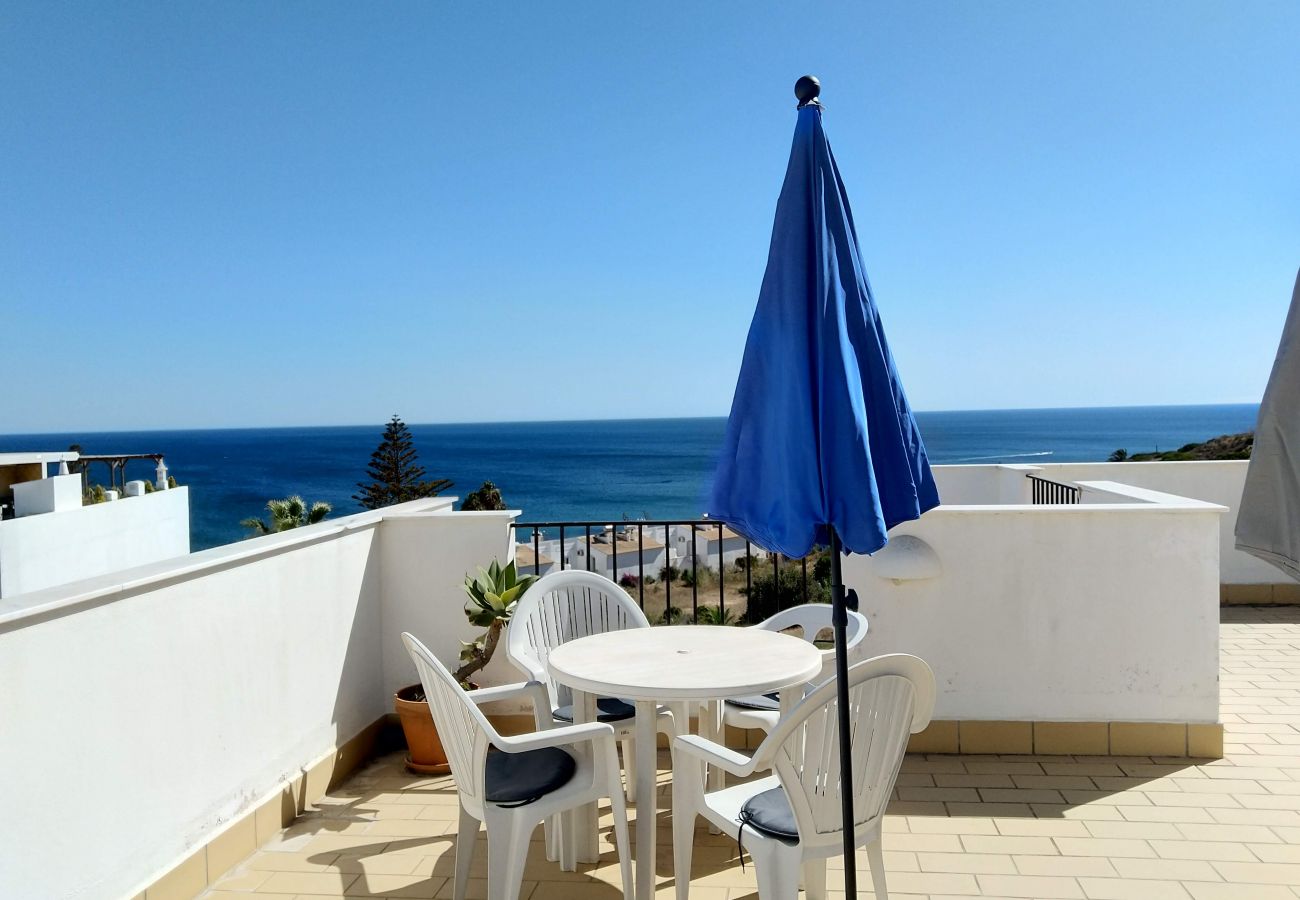 Fantastic roof terrace with sea view to relax and enjoy Dreamlike roof terrace of Casa Luzgraça with parasol and chairs