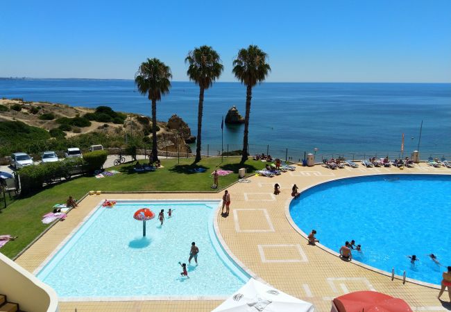 Iberlagos community pool with sea view directly above Dona Ana beach