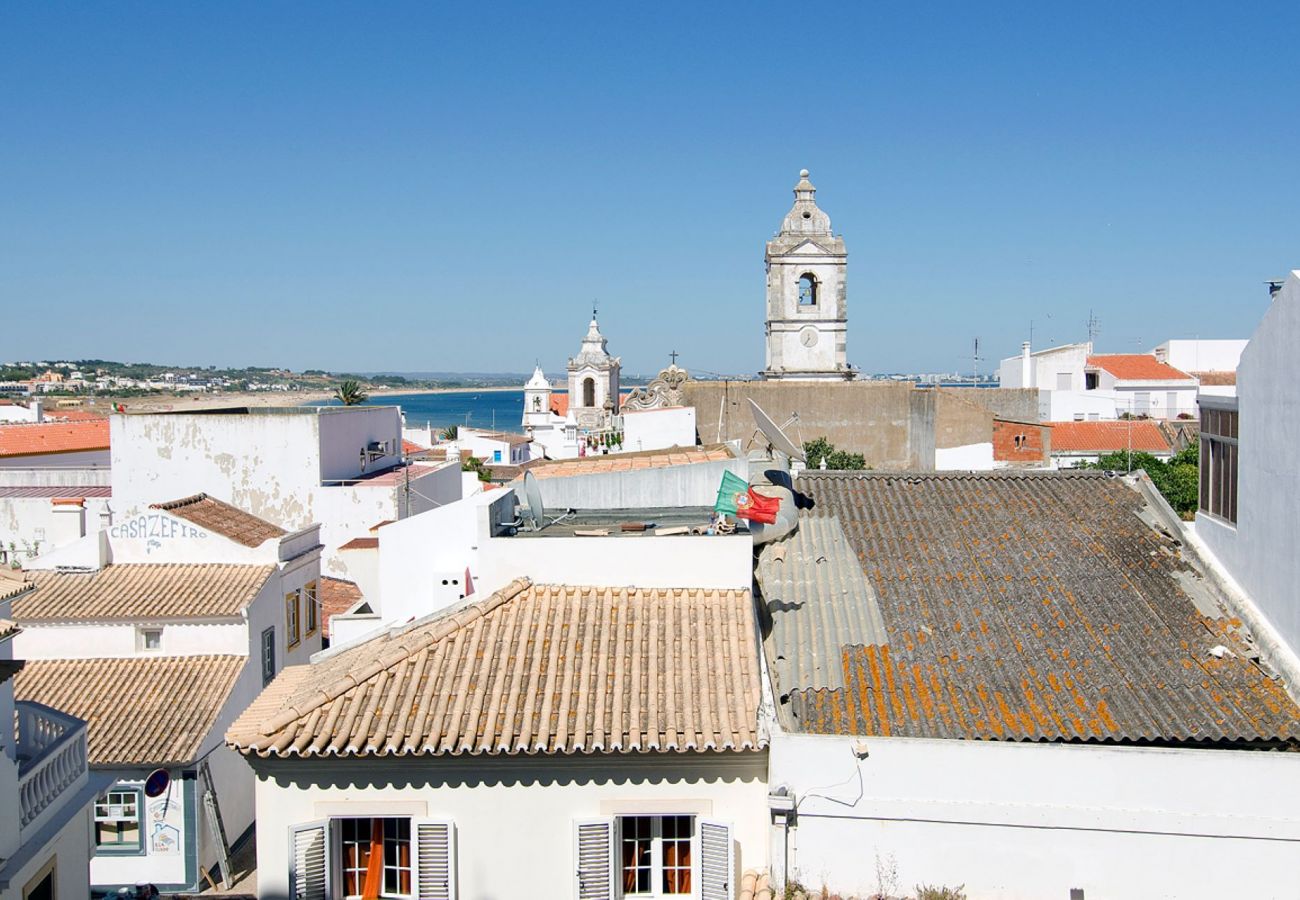 Vista da cidade e da Meia Praia a partir da Casa Marimba Vista da cidade e da Meia Praia a partir da Casa Marimba