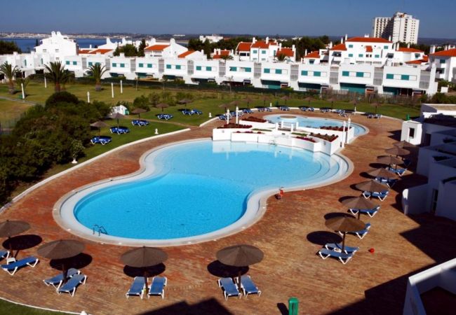 Casa em Alvor - Casa Pastrano mesmo em frente à praia e 3 piscinas comuns Casa em Alvor - Casa Pastrano mesmo em frente à praia e 3 piscinas comuns